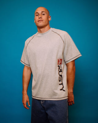 Man wearing Stone Cold Short Sleeve Tee in Grey Marle