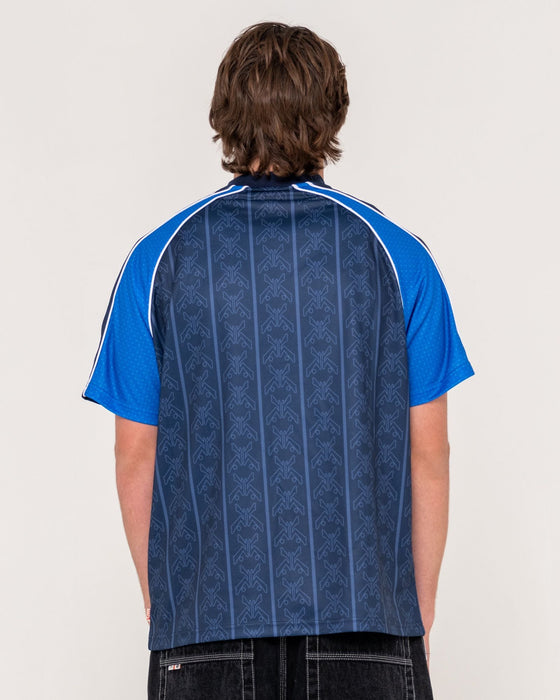 man-wearing-frenetic-short-sleeve-tee-in-navy-blue