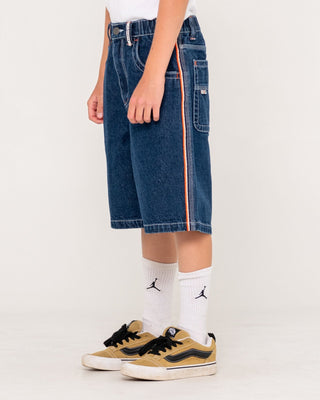 Boy wearing Flip Daddy Jort Boys - Deep Sea Blue in Deep Sea Blue / Orange