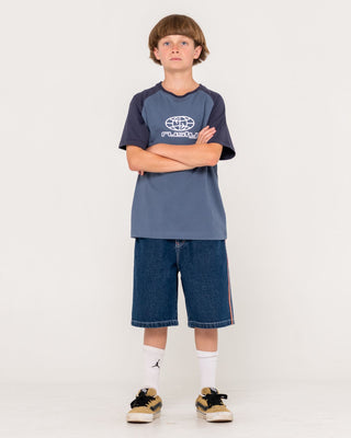 Boy wearing Flip Daddy Jort Boys - Deep Sea Blue in Deep Sea Blue / Orange