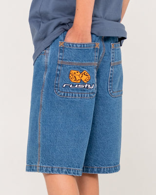 Boy wearing Flip Daddy Low Ballin Jort Boys in Middy Blue