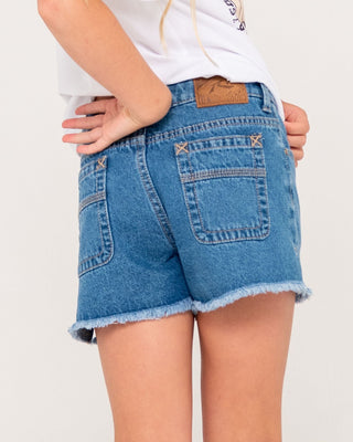 Girl wearing Penny Kick Flare Denim Short Girls in Middy Blue