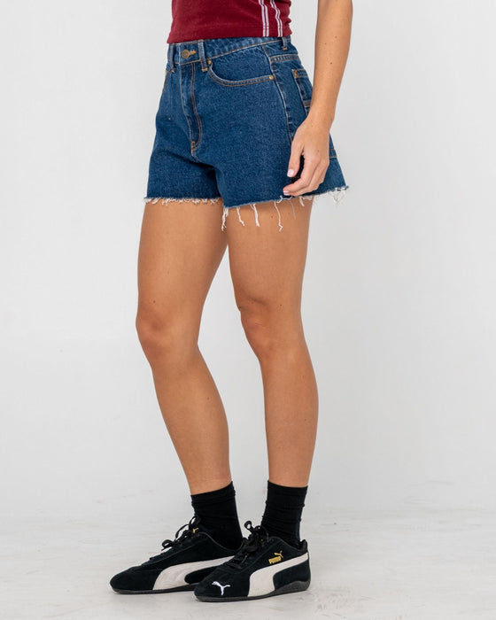 woman-wearing-penny-kick-flare-denim-short-in-deep-sea-blue