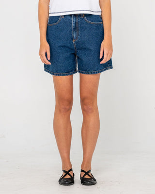 Woman wearing Cyprus High Denim Short in Deep Sea Blue