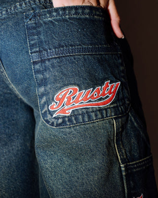 Woman wearing Billie Low Rise Carpenter Jort in Dark N Dirty