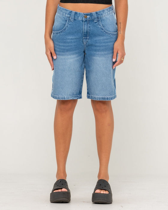 woman-wearing-flip-mommy-low-rise-wide-leg-denim-jort-in-blasted-middy-blue-blue