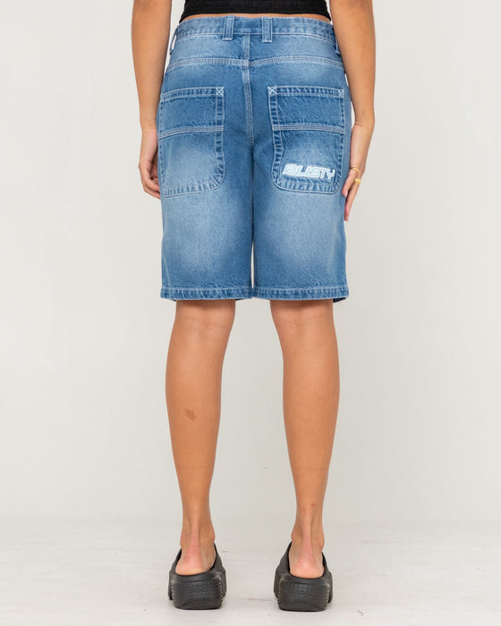woman-wearing-flip-mommy-low-rise-wide-leg-denim-jort-in-blasted-middy-blue-blue