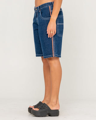 Woman wearing Flip Mommy Low Rise Wide Leg Denim Jort in Deep Sea Blue / Orange