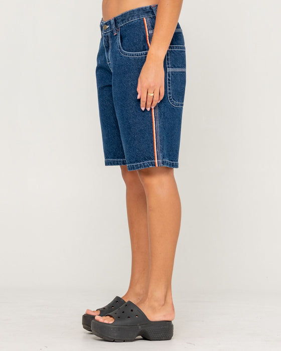 woman-wearing-flip-mommy-low-rise-wide-leg-denim-jort-in-deep-sea-blue-orange