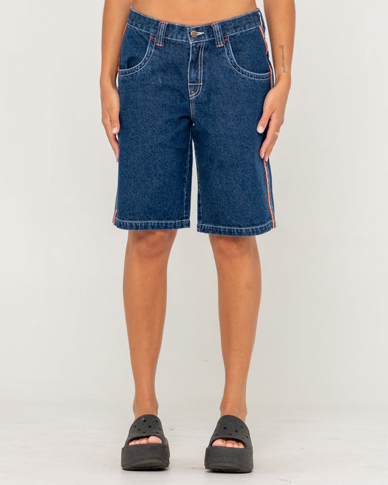 woman-wearing-flip-mommy-low-rise-wide-leg-denim-jort-in-deep-sea-blue-orange