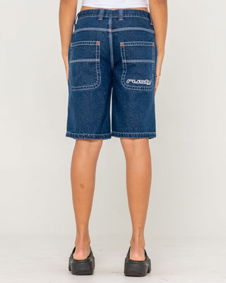 Woman wearing Flip Mommy Low Rise Wide Leg Denim Jort in Deep Sea Blue / Orange