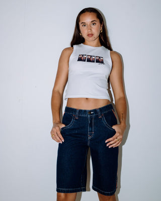 Woman wearing Flip Mommy Low Rise Wide Leg Denim Jort in Deep Sea Blue / Orange