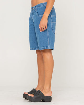 Woman wearing Flip Mommy Tapeless Low Rise Denim Short in Middy Blue