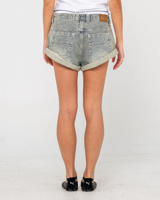 woman-wearing-pheonix-low-rise-denim-mini-short-in-dirty-dawg