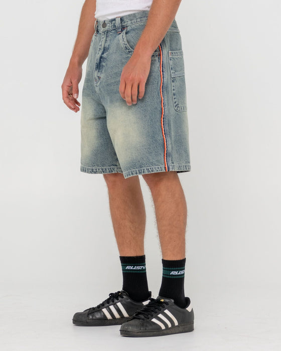 man-wearing-flip-daddy-2-0-jort-dirty-dawg-in-dirty-dawg-orange