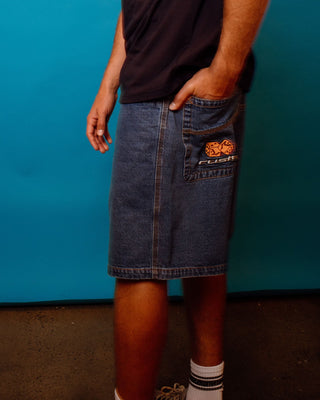 Man wearing Flip Daddy Low Ballin Jort in Middy Blue