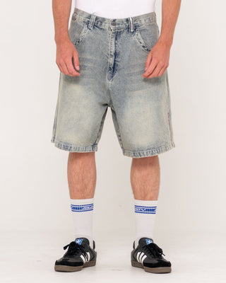 Man wearing Stone Cold Baggy Jort in Dirty Dawg