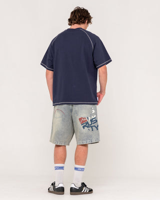Man wearing Stone Cold Baggy Jort in Dirty Dawg