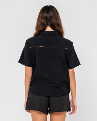 Woman wearing Rummer Has It Short Sleeved Shirt in Black