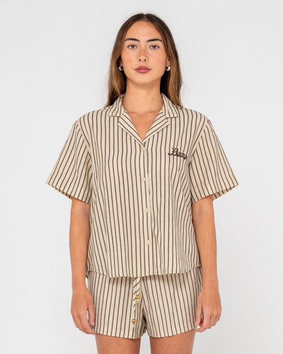 woman-wearing-sandy-stripe-short-sleeved-shirt-in-oatmeal-stripe