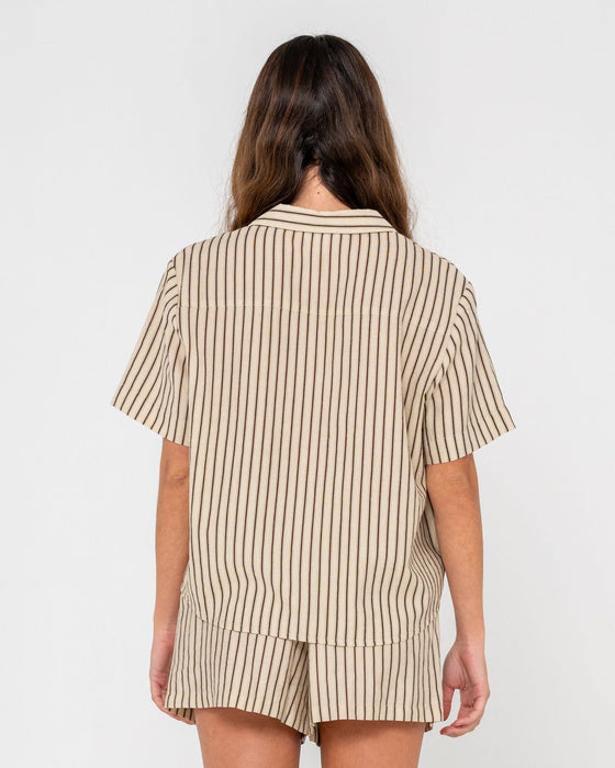 woman-wearing-sandy-stripe-short-sleeved-shirt-in-oatmeal-stripe