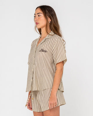 Woman wearing Sandy Stripe Short Sleeved Shirt in Oatmeal Stripe