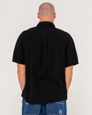 Man wearing Overtone Short Sleeve Linen Shirt in Black