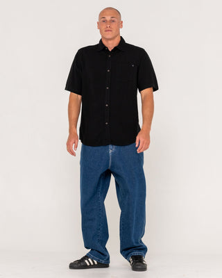 Man wearing Overtone Short Sleeve Linen Shirt in Black