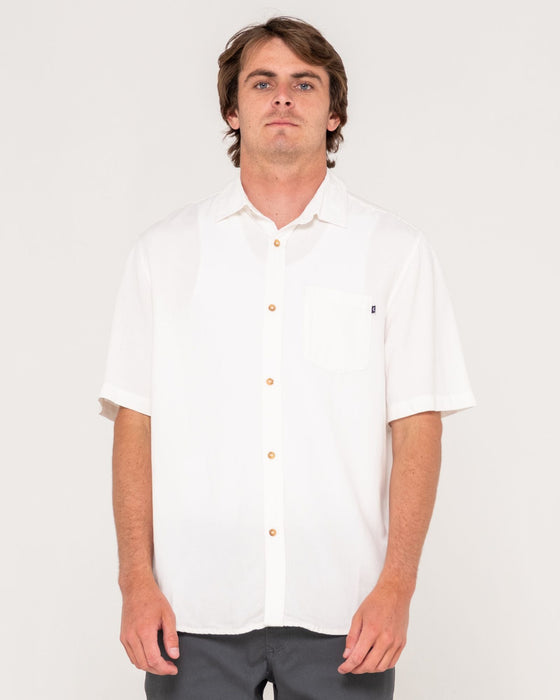 man-wearing-overtone-short-sleeve-linen-shirt-in-whisper-white