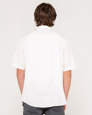 Man wearing Overtone Short Sleeve Linen Shirt in Whisper White
