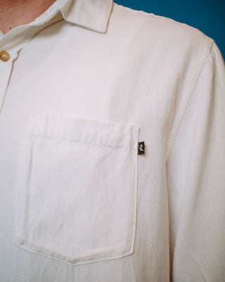 Man wearing Overtone Short Sleeve Linen Shirt in Whisper White
