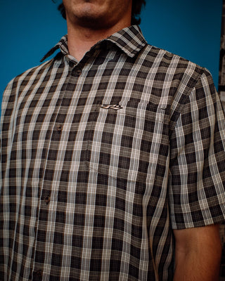 Man wearing Datsun Check Short Sleeve Shirt in Black