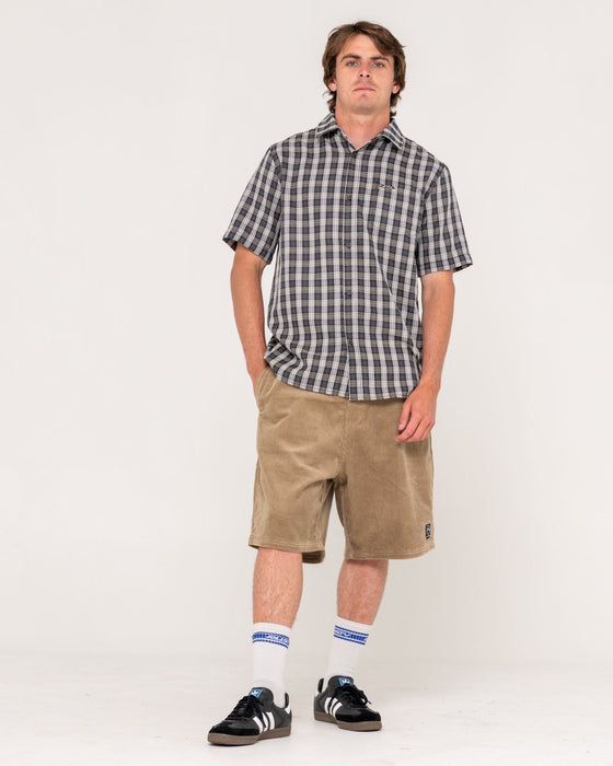 man-wearing-datsun-check-short-sleeve-shirt-in-black