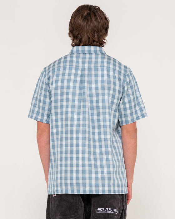 man-wearing-datsun-check-shirt-in-dolphin-blue