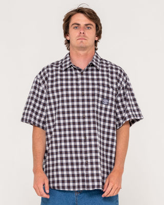 Man wearing Worldwide Curved Hem Short Sleeve Shirt in Carbon