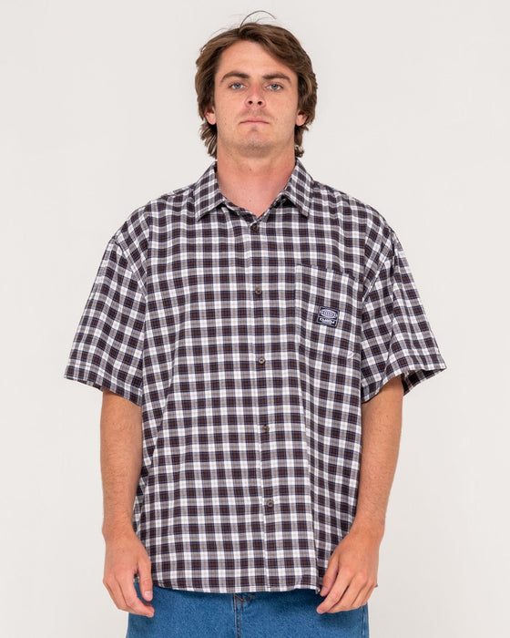 man-wearing-worldwide-curved-hem-short-sleeve-shirt-in-carbon