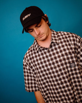 Man wearing Worldwide Curved Hem Short Sleeve Shirt in Carbon