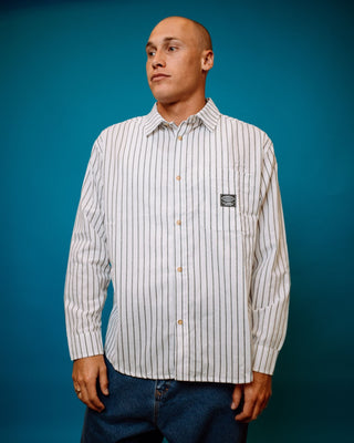 Man wearing Vallejo Tech Long Sleeve Shirt in White