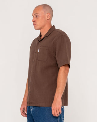 Man wearing Canseco Vacation Short Sleeve Shirt in Pinecone