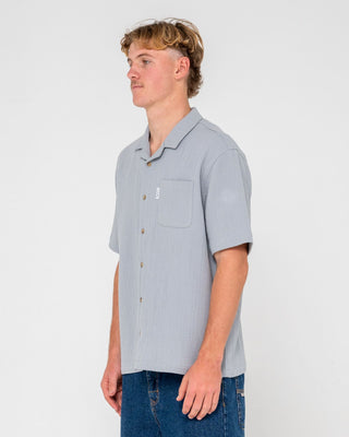 Man wearing Canseco Vacation Short Sleeve Shirt in Ultimate Grey