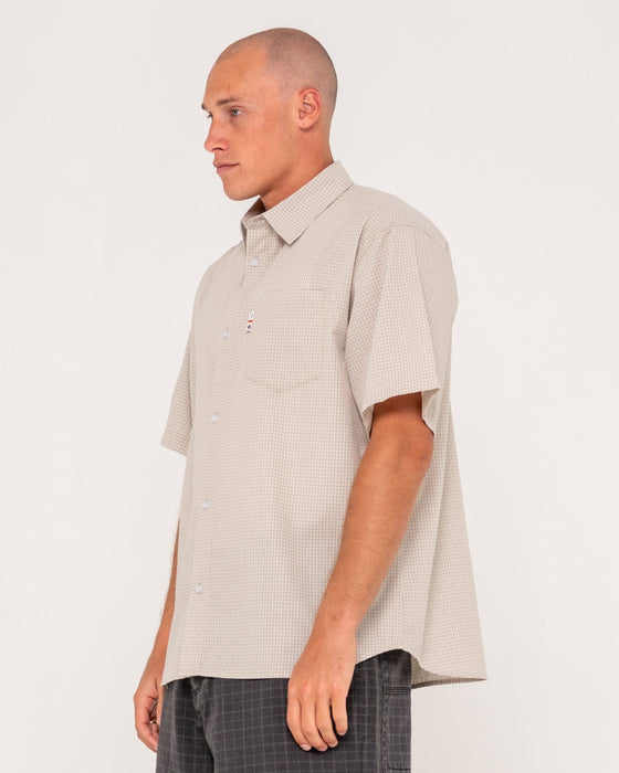 man-wearing-stasha-pocket-short-sleeve-shirt-in-light-khaki