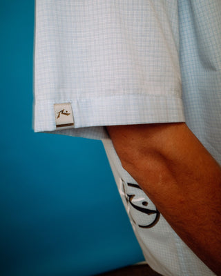 Man wearing Hoodus Check Short Sleeve Shirt in Smoke Blue