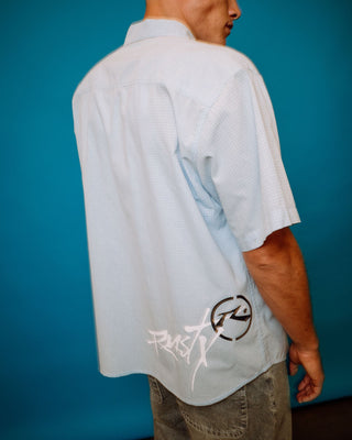 Man wearing Hoodus Check Short Sleeve Shirt in Smoke Blue