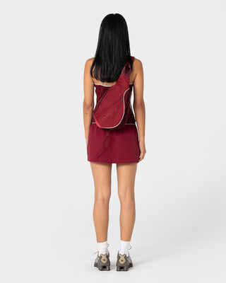 Womens Free Run Nylon Sling Backpack in Burgundy