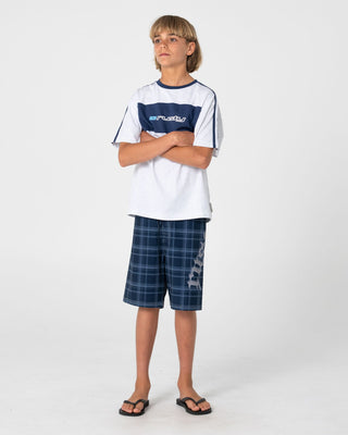 Boy wearing Scream Fixed Waist Boardshort Boys in Navy Blue Plaid