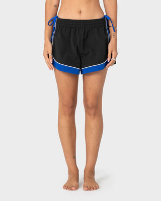 Woman wearing Elastic Panel Crank Boardshort in Coal