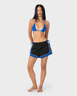Woman wearing Elastic Panel Crank Boardshort in Coal