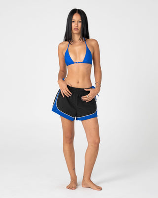Woman wearing Elastic Panel Crank Boardshort in Coal