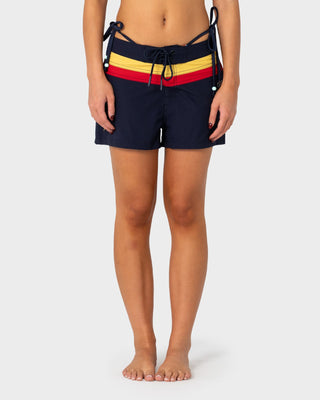 Woman wearing Onya Sonya Archival Boardshort in Navy Blue