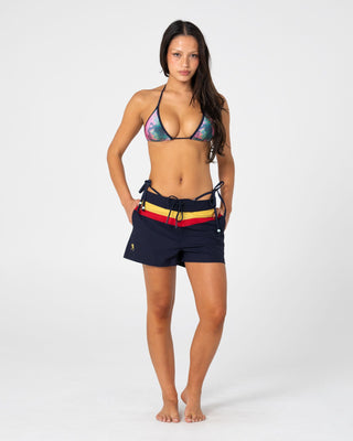 Woman wearing Onya Sonya Archival Boardshort in Navy Blue